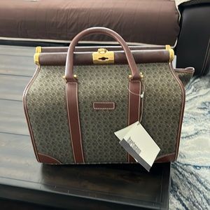 Hartmann travel makeup bag and the color is vintage brown.